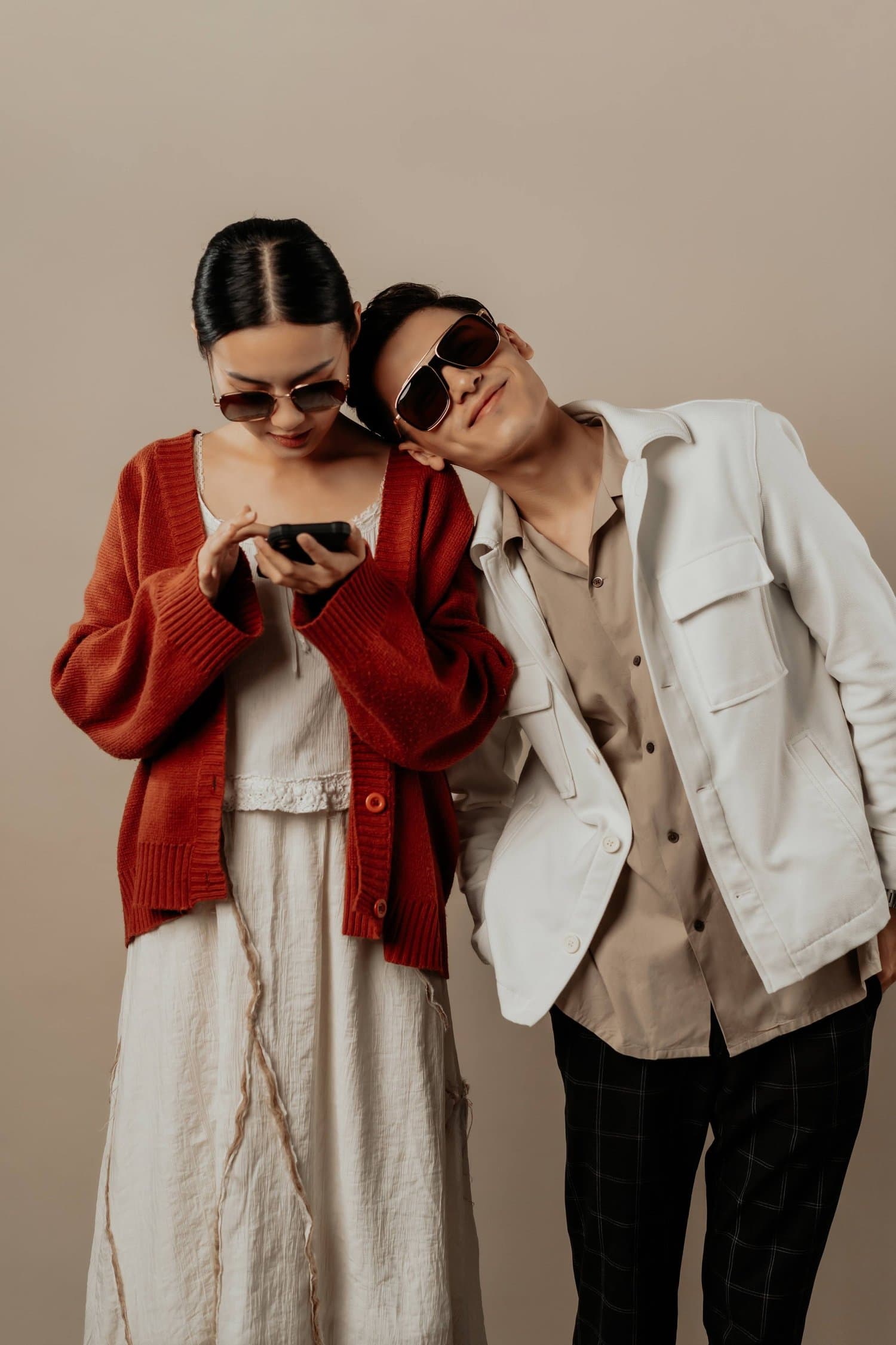 Two models wearing sunglasses in White Balance Studio’s Braun Büffel campaign